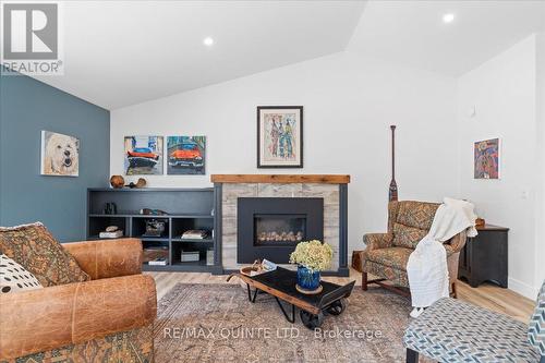 1169 Wilson Road, Prince Edward County, ON - Indoor Photo Showing Living Room With Fireplace