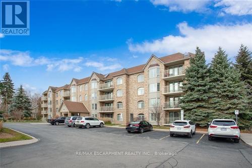 A103 - 216 Plains Road, Burlington, ON - Outdoor With Balcony With Facade