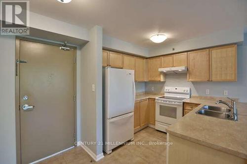 #210 -16 Westbury Rd, Wasaga Beach, ON - Indoor Photo Showing Kitchen With Double Sink