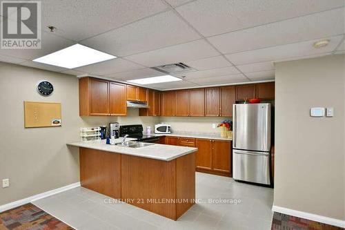 210 - 16 Westbury Road, Wasaga Beach, ON - Indoor Photo Showing Kitchen With Double Sink