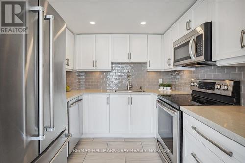 #203 -65 Ellen St, Barrie, ON - Indoor Photo Showing Kitchen With Upgraded Kitchen