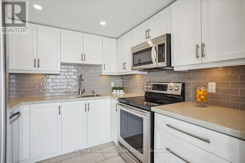 203 - 65 Ellen Street, Barrie, ON - Indoor Photo Showing Kitchen With Upgraded Kitchen