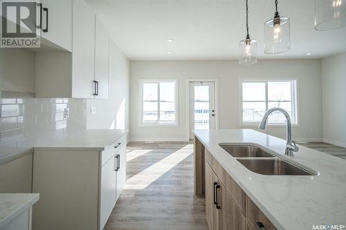 202 170 Mirond Road, Martensville, SK - Indoor Photo Showing Kitchen With Double Sink