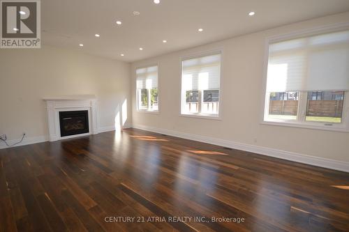19 Mumberson Street, Innisfil, ON - Indoor Photo Showing Living Room With Fireplace