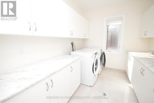 19 Mumberson St, Innisfil, ON - Indoor Photo Showing Laundry Room