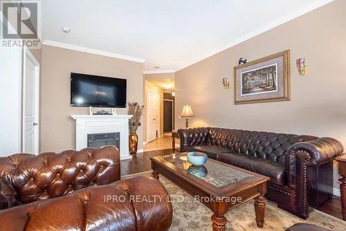 #1506 -1 Belvedere Crt, Brampton, ON - Indoor Photo Showing Living Room With Fireplace