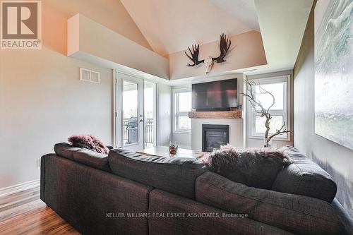 #302 -4 Anchorage Cres, Collingwood, ON - Indoor Photo Showing Living Room With Fireplace