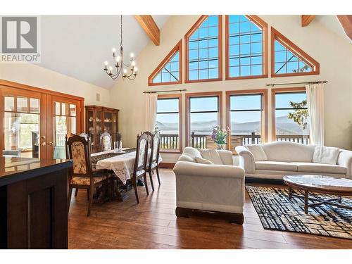3328 Roncastle Road, Blind Bay, BC - Indoor Photo Showing Dining Room With Fireplace