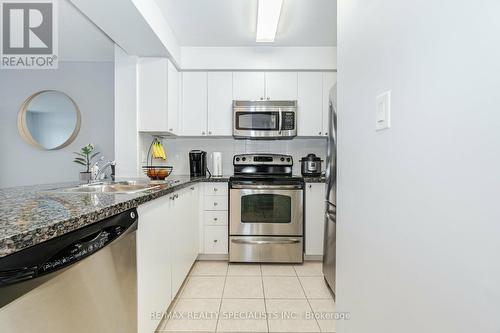 #410 -4850 Glen Erin Dr, Mississauga, ON - Indoor Photo Showing Kitchen With Double Sink