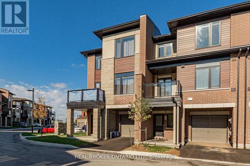 106 - 590 North Service Road N, Hamilton, ON - Outdoor With Balcony With Facade
