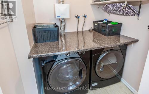 #1207 -310 Mill St S, Brampton, ON - Indoor Photo Showing Laundry Room