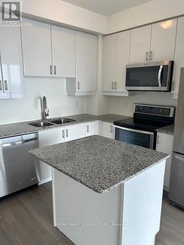 #1003 -2900 Highway 7, Vaughan, ON - Indoor Photo Showing Kitchen With Double Sink With Upgraded Kitchen
