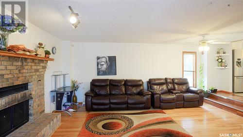 13 Procter Place, Regina, SK - Indoor Photo Showing Living Room With Fireplace