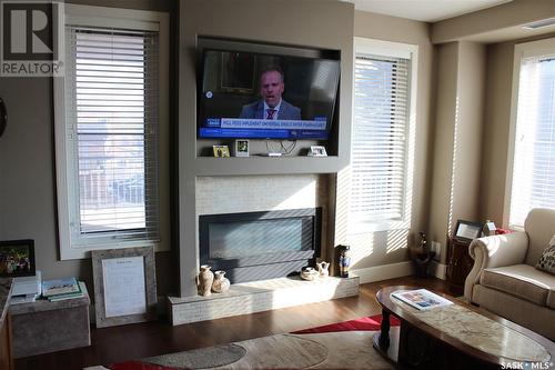 202 205 Fairford Street E, Moose Jaw, SK - Indoor Photo Showing Living Room With Fireplace