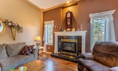 2410 Aspen Place, Creston, BC - Indoor Photo Showing Living Room With Fireplace