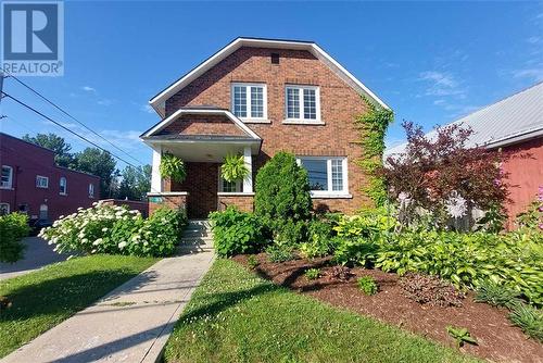 Beautiful perennial gardens surround the home and shop - 1874 / 1876 Beachburg Road, Beachburg, ON - Outdoor