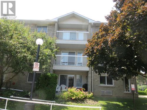 226B - 1099 Clonsilla Avenue, Peterborough, ON - Outdoor With Balcony With Facade