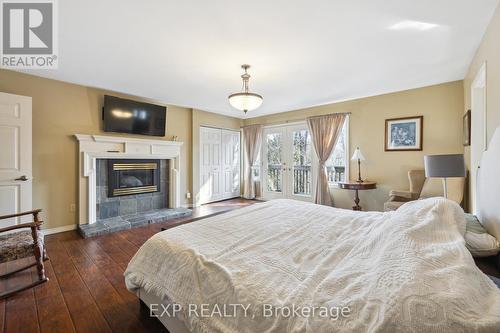 95 Credit Road, Caledon, ON - Indoor Photo Showing Bedroom With Fireplace