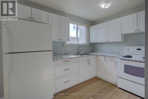 #34 -1033 Craig Lane, Kingston, ON - Indoor Photo Showing Kitchen With Double Sink