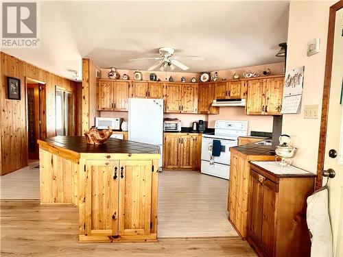 Kitchen & Dining Space with access to the partial wrap-around Porch - 1757 Bennett Lake Road, Balderson, ON - Indoor