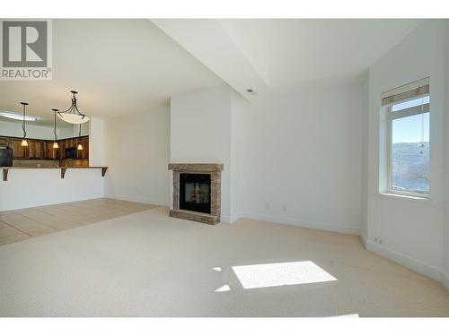 3996 Beach Avenue Unit# 313, Peachland, BC - Indoor With Fireplace