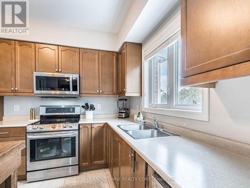14 Ryan St, Centre Wellington, ON - Indoor Photo Showing Kitchen With Double Sink