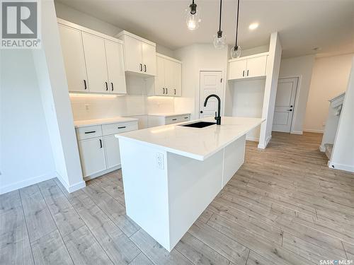 174 Schmeiser Lane, Saskatoon, SK - Indoor Photo Showing Kitchen With Upgraded Kitchen