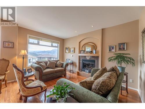 11908 La Costa Lane, Osoyoos, BC - Indoor Photo Showing Living Room With Fireplace