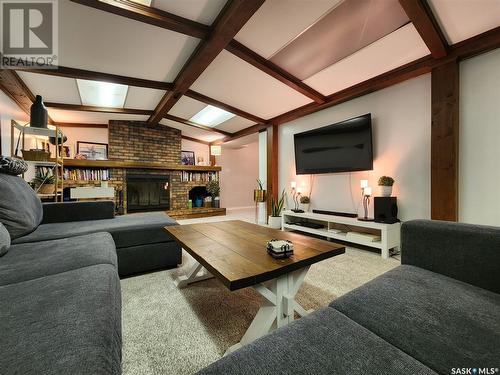 1318 Douglas Road, Weyburn, SK - Indoor Photo Showing Living Room With Fireplace