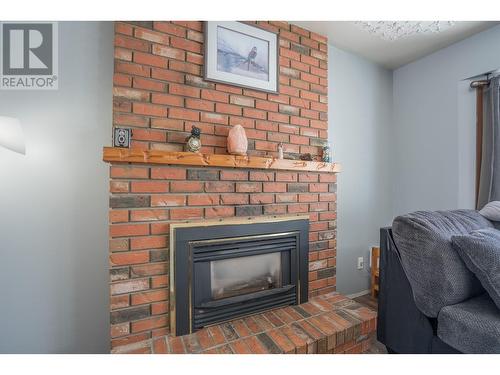 7736 St Mathew Place, Prince George, BC - Indoor Photo Showing Living Room With Fireplace