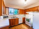 9450 Central Lake Rd, Port Alberni, BC  - Indoor Photo Showing Kitchen With Double Sink 