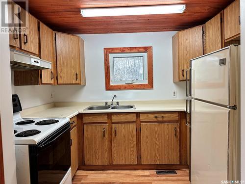 320 Evenson Avenue, Manitou Beach, SK - Indoor Photo Showing Kitchen With Double Sink