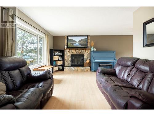 9719 Buchanan Road, Coldstream, BC - Indoor Photo Showing Living Room With Fireplace