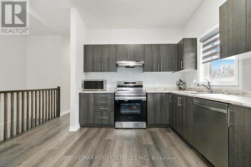 #10 -550 Grey St W, Brantford, ON - Indoor Photo Showing Kitchen With Double Sink