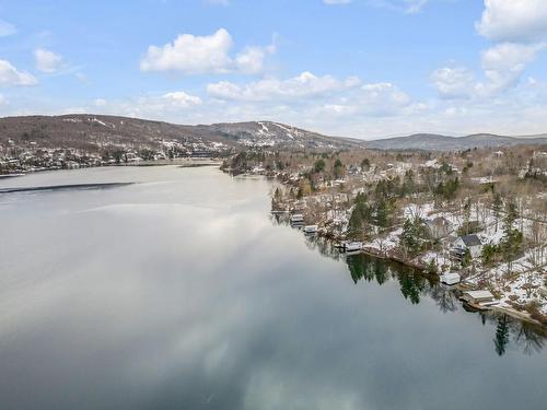 Aerial photo - 15 Ch. Du Versant-Nord, Lac-Beauport, QC - Outdoor With Body Of Water With View
