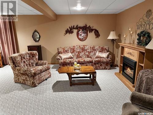 114 202 Lister Kaye Crescent, Swift Current, SK - Indoor Photo Showing Living Room With Fireplace