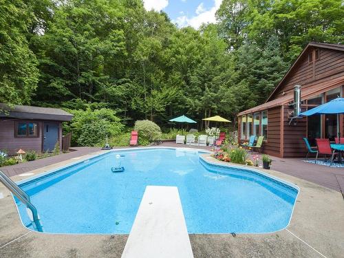 Pool - 123 Ch. De La Galène, Piedmont, QC - Outdoor With In Ground Pool With Backyard