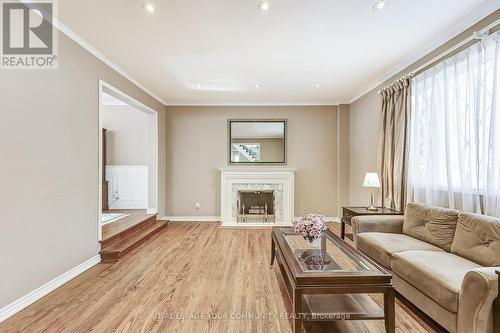 25 Alcaine Crt, Markham, ON - Indoor Photo Showing Living Room With Fireplace