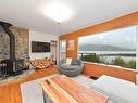 16919 Tsonoqua Dr, Port Renfrew, BC  - Indoor Photo Showing Living Room With Fireplace 