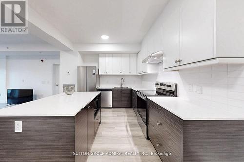 #206 -19 A West St N, Kawartha Lakes, ON - Indoor Photo Showing Kitchen With Double Sink With Upgraded Kitchen