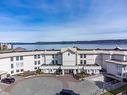 205-87 Island Hwy South, Campbell River, BC  - Outdoor With Body Of Water With Balcony With Facade 