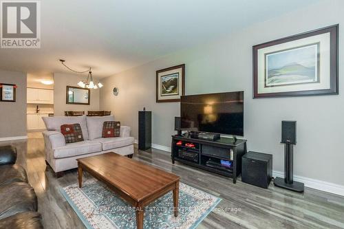#103 -245 Queen St W, Centre Wellington, ON - Indoor Photo Showing Living Room