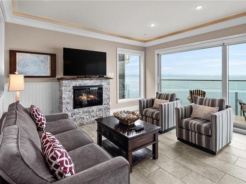 42B-1000 Sookepoint Pl, Sooke, BC - Indoor Photo Showing Living Room With Fireplace