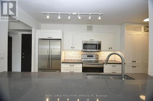 #239 -22 Southport St, Toronto, ON - Indoor Photo Showing Kitchen With Stainless Steel Kitchen