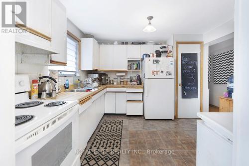 25 Haggert Ave S, Brampton, ON - Indoor Photo Showing Kitchen With Double Sink