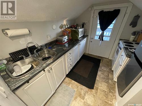 1111 23Rd Street W, Saskatoon, SK - Indoor Photo Showing Kitchen With Double Sink