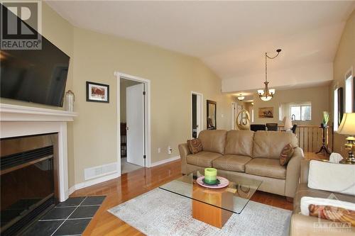 38 Armagh Way, Ottawa, ON - Indoor Photo Showing Living Room With Fireplace
