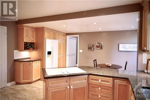 Bright kitchen overlooking deck and forest - 1776 Radage Road, Kingston, ON - Indoor Photo Showing Kitchen