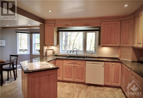 Custom cabinetry and granite countertops - 1776 Radage Road, Kingston, ON - Indoor Photo Showing Kitchen