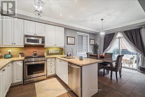415 Vellore Park Ave, Vaughan, ON - Indoor Photo Showing Kitchen With Stainless Steel Kitchen With Double Sink